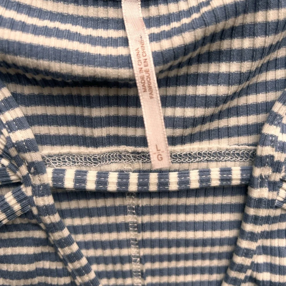 Free People Frenchie knit top with a striped pattern and cut-out neckline Large